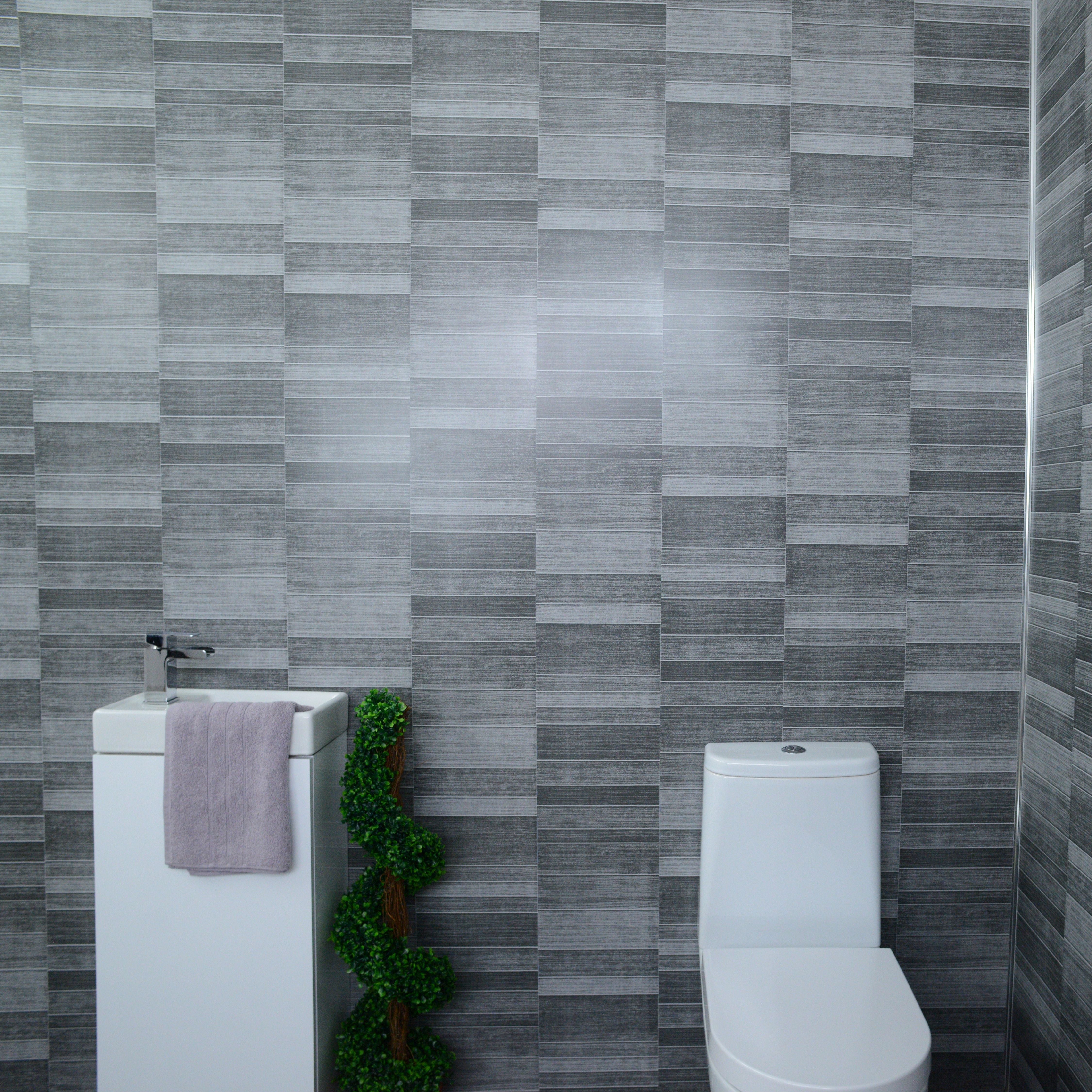 Our Dark Grey Small Tile PVC Panel is a quick and effective way of enhancing luxury into your bathroom or any other areas.