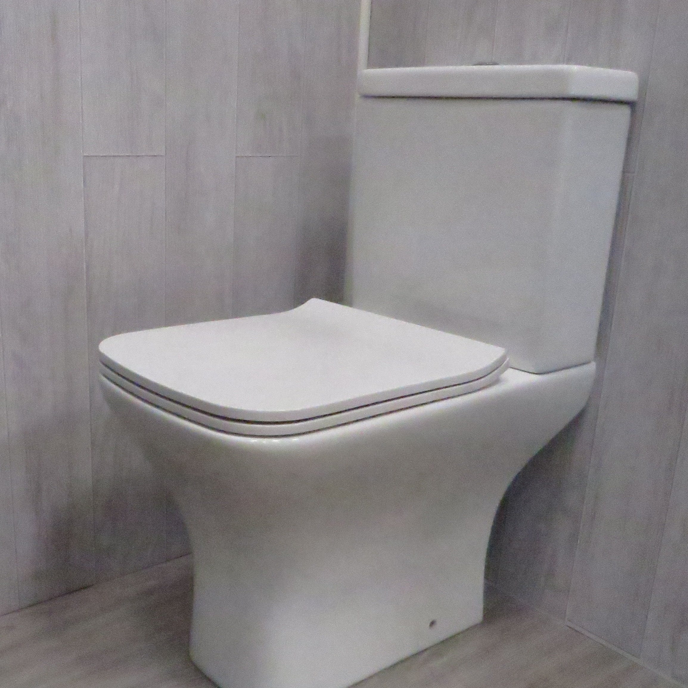 Sample of Limewash Ash 8mm Bathroom Cladding PVC Wall Panels